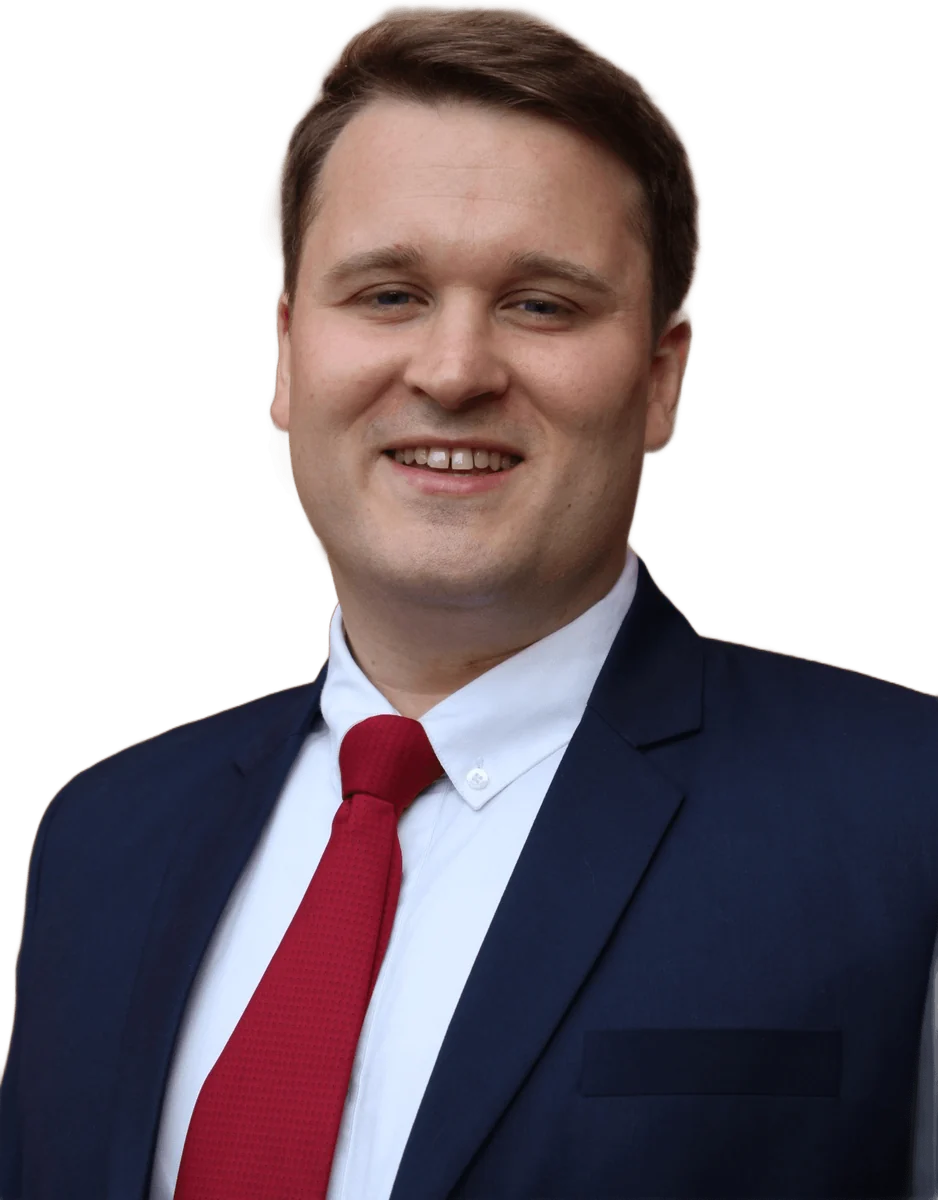 Samuel Moult in a navy suit